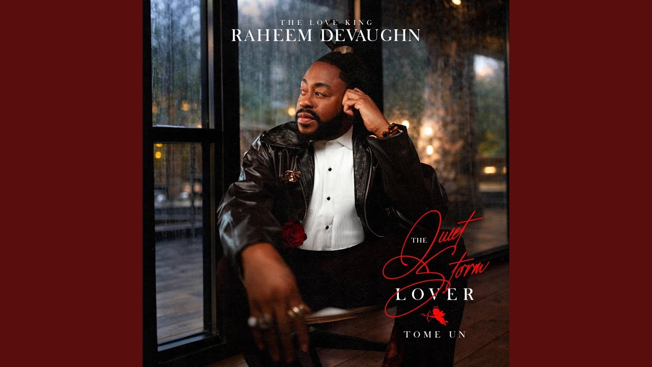 Album cover for Raheem DeVaughn's The Love King: man in a black leather coat and white tux shirt sits by a window, red rose boutonniere, red cursive title on the right.